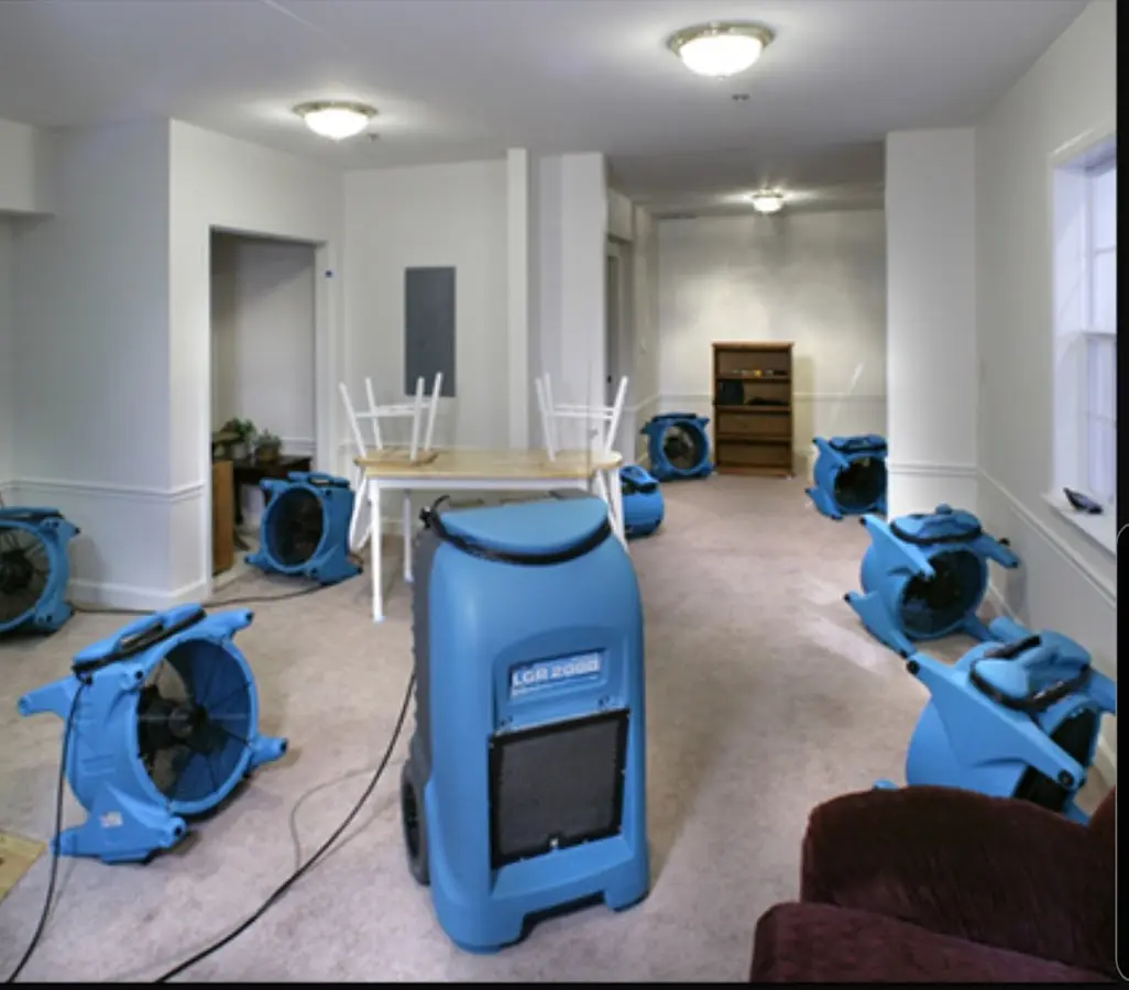 Air movers and dehumidifier setup for Water Damage Restoration in Eagle